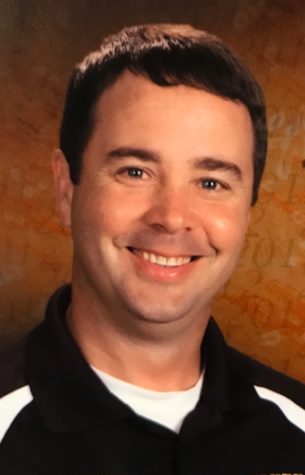 Strader steps down
