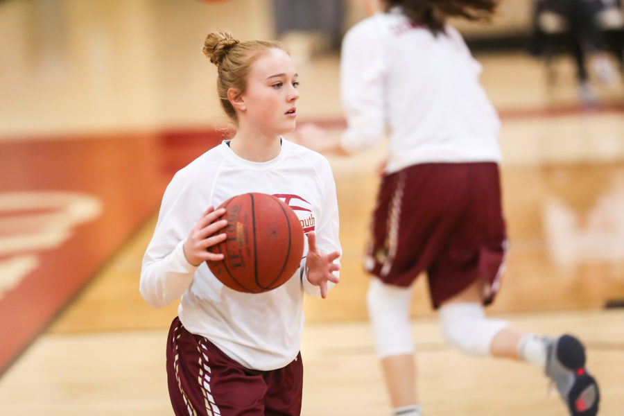 Senior+guard+Anna+Harvey+warms+up+before+a+game.