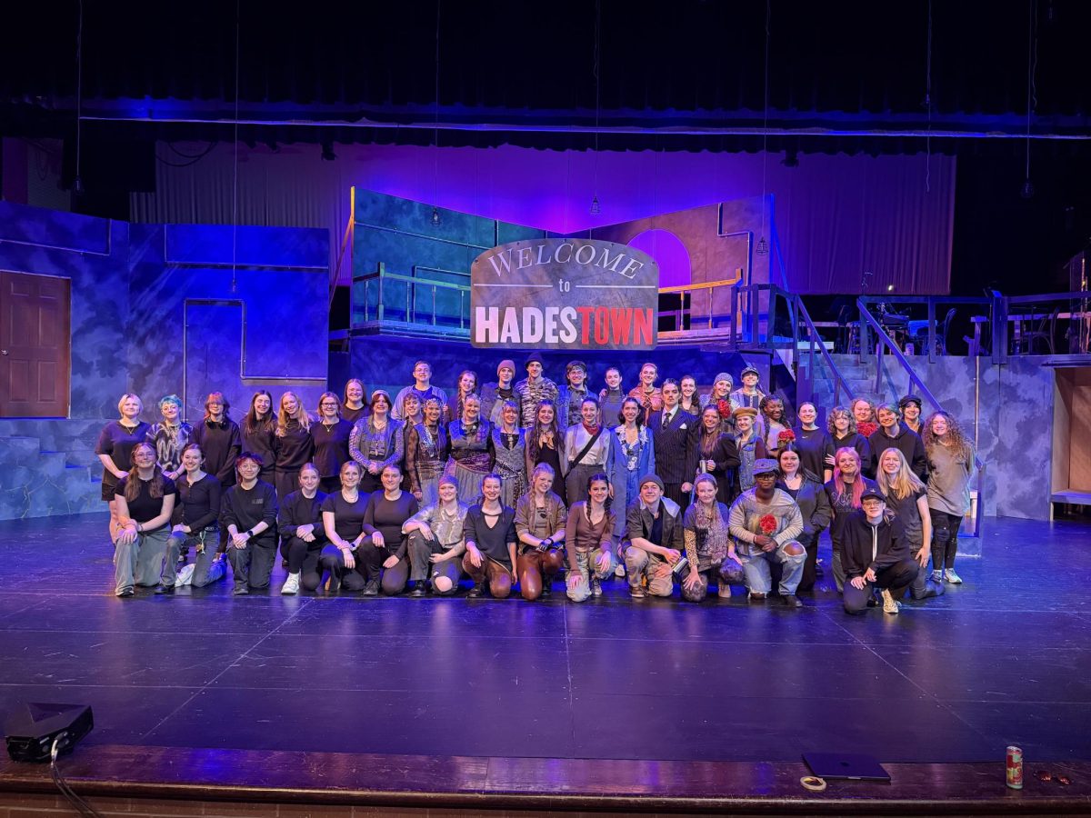 Hadestown at LSHS. Front Row (Left to Right): Addison Null, Olivia Larscheid, M Lyboualong, Sarah Yoho, Lucy Botsford, Daisy Trewin, Audrey Hove, Alanna Frank, Rachel Naatjes, Hannah Walker, Landon Woodson, Lucy Hofford, Purity Nyaisisi, Bella Hurney, Molly-Ann Yoho, Jackie Gavin, Vienna Peterson.
Middle Row: Kai Mellum-Jones, Emerson Porter, Cat Meyers, Lauren Moldestad, Aly Behnken, Lauren Pihlstrom, Jay Thayer, Emily Brelji, Oliver Child, Kali LeBaron, Josie TeHennepe, Gina Schonthaler, Sarah Conner, Marie Ruegg, Jordan Rivera, Theodore Millington, Olivia Olmsted, Ella Hentges, Janessa Oppong, Maddy Cohoe, Francis Wilkinson, Bella Love, Oliver Madison, Alastar Fahlstorm, Aubrey Mueller. 
Back Row: Alex Bassett, Lily Crawford, Caleb Schultz, Parker Wirth, Preston Conner, Maddie Berglund, Liliana Reid, Ami Quick, Jaygan Hepworth, Liam Zampogna. 